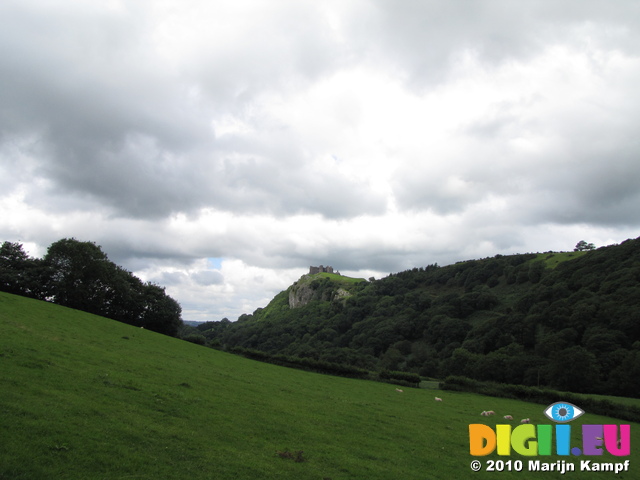 SX16159 Carreg Cennen Castle on top of distant cliffs